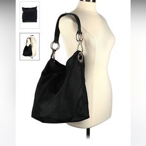 JPK Paris 75 Black hobo bag in excellent condition Beautiful floral lining.